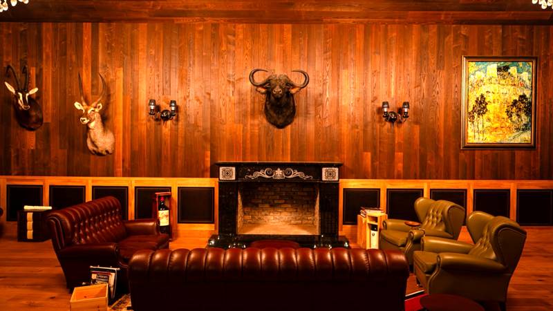 The trophy wall and fireplace