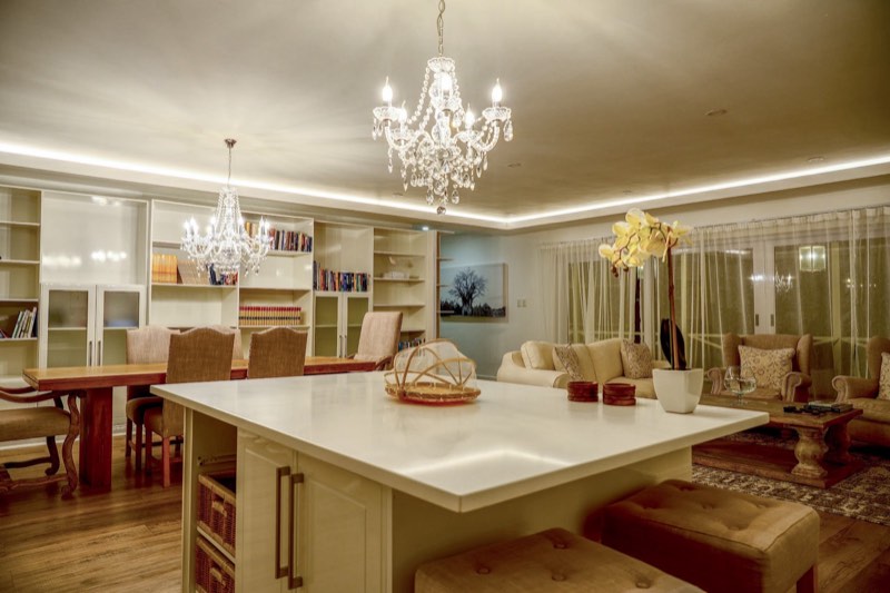 Kitchen with island and chandeliers